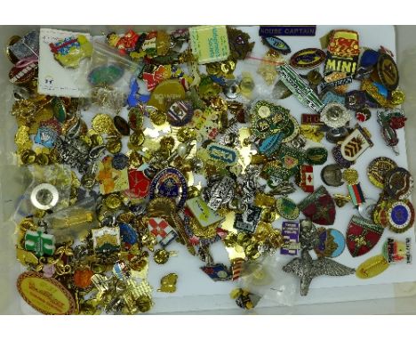 A collection of enamel badges
