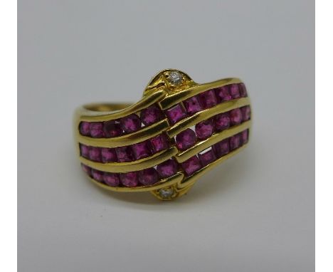An 18ct gold, ruby and diamond ring, 4.1g, N