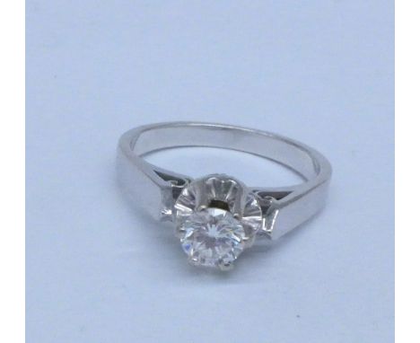 A white gold and diamond ring, stamped 750, 0.35ct diamond weight, 4.7g, O