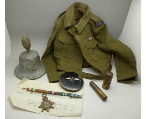 Military related items;- a 1914-15 Star to M.705, J.R. Williams S.B.S.2,R.N., a child's size army uniform jacket, a R.A.F. Be