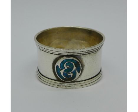 A silver and enamel napkin ring, Birmingham 1909, William Hair Haseler