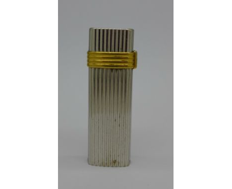 A Christian Dior lighter