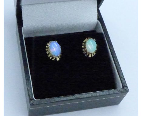 A pair of 9ct gold and opal stud earrings