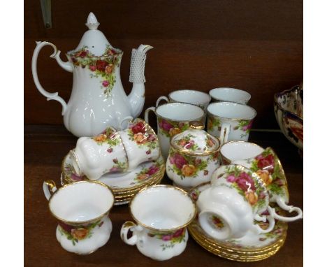 Royal Albert Old Country Roses coffee ware comprising coffee pot, seven small cups, five saucers, four coffee mugs, five larg