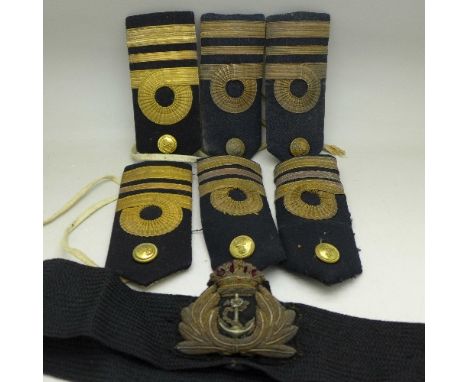 Three pairs of uniform shoulder epaulets, one pair marked Gieves and one other item