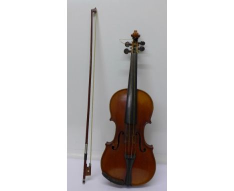 A violin with paper label, Antonius Stradivarius Cremona facie bat Anno 1729, length of back without button 32cm, cased