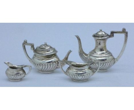 A hallmarked silver novelty miniature four piece tea and coffee service, Birmingham 1992