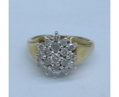 A 9ct gold and diamond cluster ring, 3.5g, J, 0.5 carat diamond weight