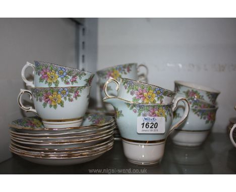 A Colclough bone china part Teaset comprising cake plate, ten side plates, nine saucers, milk jug, sugar bowl and seven teacu