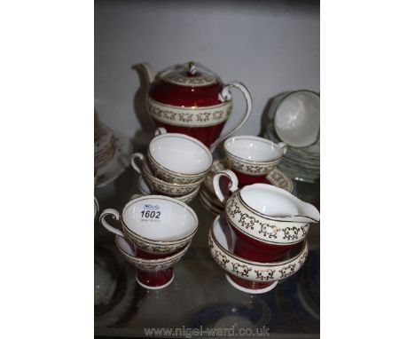 A vintage Aynsley red gilded Coffee Set including six cups, six saucers, milk jug, sugar bowl and Coffee Pot