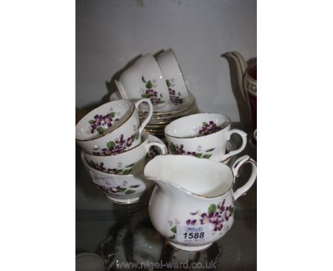 A Duchess bone china 'Violetta' pattern part Teaset including cake plate, sugar bowl, milk jug, six side plates, six cups and