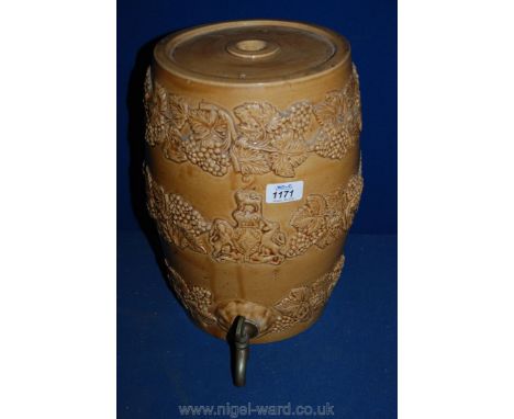A salt glazed ceramic Sherry Barrel decorated with floral motifs and coat of arms, marked No. 2, with brass tap, 13'' high.