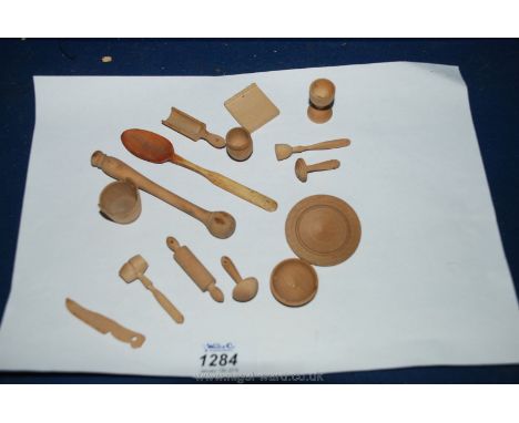 A tub of miniature Treen items including rolling pin, water bucket, bowl, mallet, urn, goblet, etc.