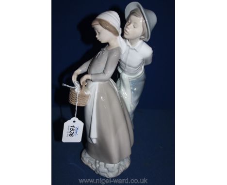 ***A Nao figurine of a Boy and Girl Standing (Not Lladro).