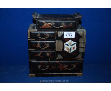 A small Oriental lacquered Cabinet with single drawer over a flight of three small drawers beside a single enamel decorated p