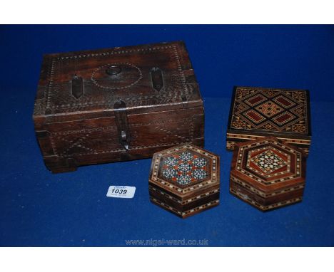 A Middle Eastern carved Box and three inlaid Trinket Boxes