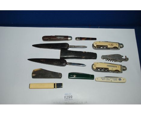 A quantity of interesting Penknives and cutters to include a vintage leather working hook end cutter with horn handle by Holb