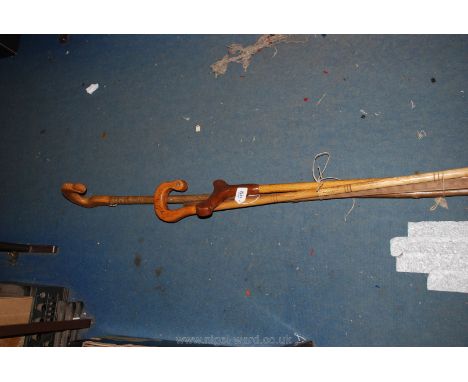 Two Shepherd's Crooks, a carved Walking Stick and an Imperial Measuring Stick