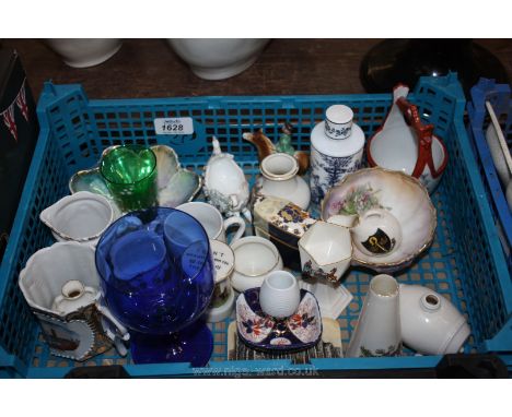 A quantity of small ceramic commemorative items including jugs, vases, mugs, etc.
