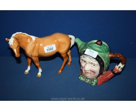 A Beswick ceramic Palomino Horse, 7" tall (with chipped ear) and a Beswick Sairy Gamp Teapot 091 (lid a/f)