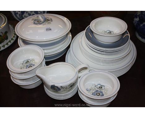 A Wedgwood Susie Cooper ''Glen Mist" blue poppy Dinner Service including meat plate, six dinner plates, two tureens with lids