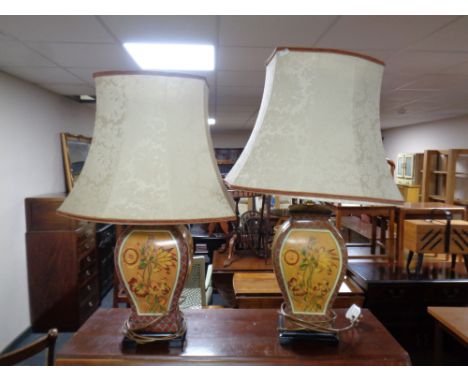 A pair of contemporary ceramic floral patterned table lamps with shades  