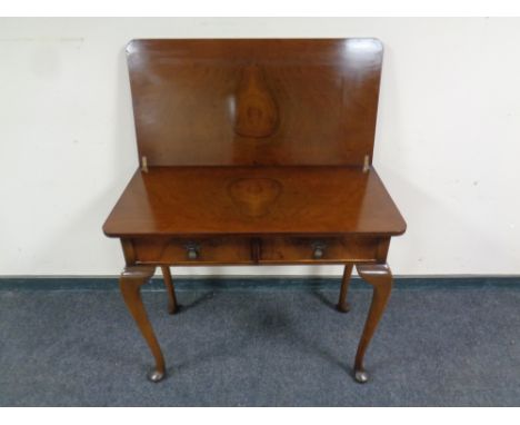 A walnut turnover top console table fitted two drawers on Queen Anne legs 