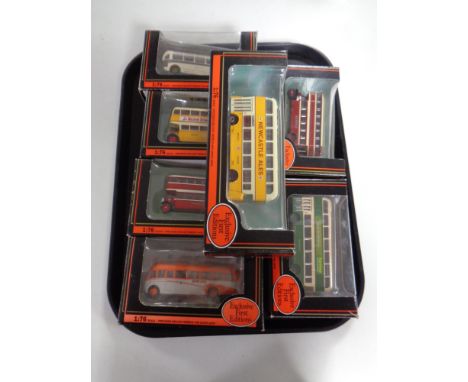 A tray containing seven exclusive first edition die cast buses (boxed)  