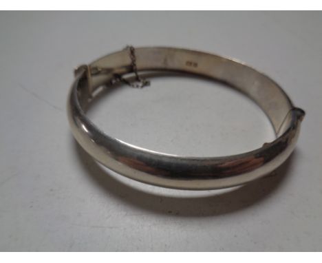 A silver bangle  