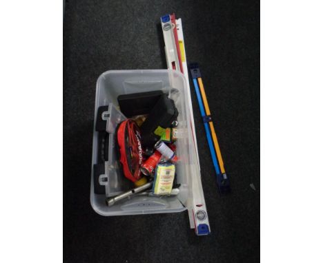 A crate of spirit levels, hand tools, hard ware, jump lead cables etc 