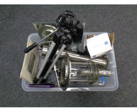 A crate of three mirrored panels, camera tripod, binoculars, out door lighting etc 