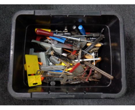 A crate of assorted hand tools 