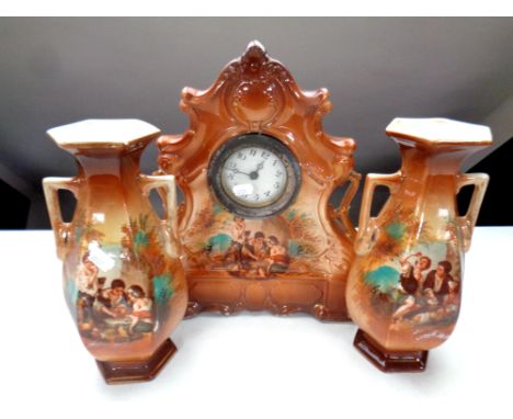 A 19th century transfer printed mantel piece clock garniture 