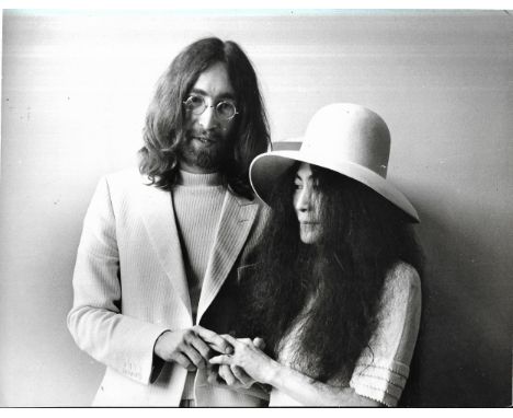 Two original vintage John Lennon & Yoko Ono photographic prints by Camera Press Ltd at their wedding in Gibraltar. All prints