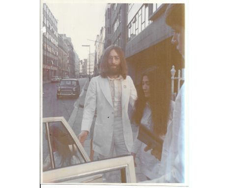 Colour original vintage photograph of John Lennon & Yoko Ono. Prints was formerly the property of Beatles Fan Club Secretary 