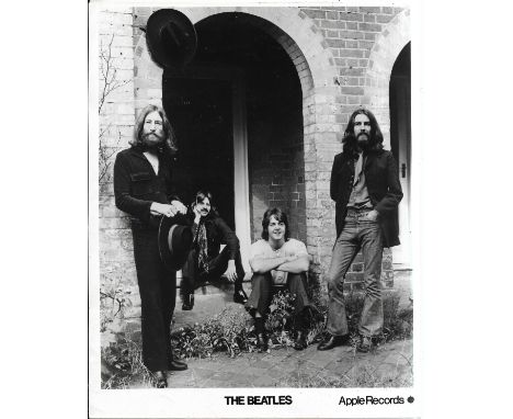 The Beatles 1969 Apple Promotional Photograph, photograph has signatures on reverse in an unknown hand.  This item is formerl