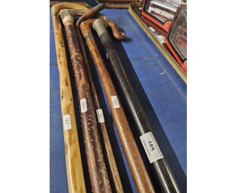 5 WALKING STICKS, SILVER MOUNTED CANE, 3 CROOKS AND A SMALL SILVER MOUNTED STICK     