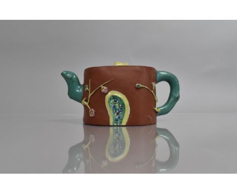 A Chinese Yixing Teapot decorated in Relief with Blossoming Branches, Applied Yellow, Green and Pink Glazed Sections. Seal Ma