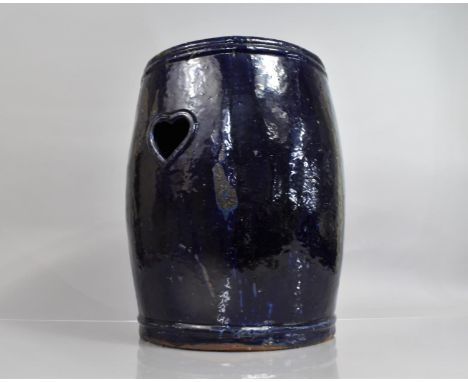 A Chinese Blue Glazed Earthenware Garden Seat of Barrel Form with Heart Shaped Pierced Sides and Central Pierced Starburst De