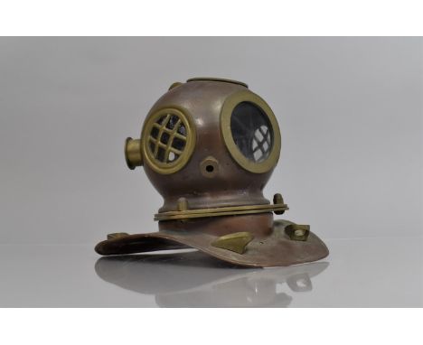 A Desk Top Brass And Copper Model of a Divers Helmet, 17cms High 