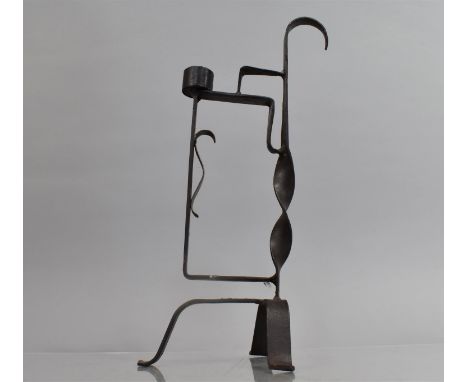 A Wrought Iron Rush Light, Tri Footed with Back Twisted Support Culminating into Hook, 31.5cms High 