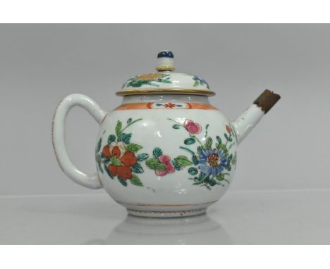 An 18th/19th Century Chinese Porcelain Teapot and Cover decorated with Blossoming Flowers in Fenced Garden, Metal Mount Repai