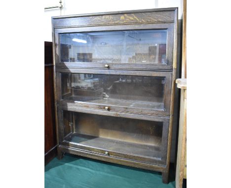 An Edwardian Oak Three Tier Globe Wernicke Style Bookcase, 87cms Wide 