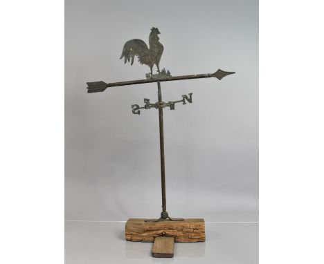 A Early 20th Century Brass Weathervane with a Cockerel Mounted Arrow Over Four Points of the Compass, 62x82cms Wide 