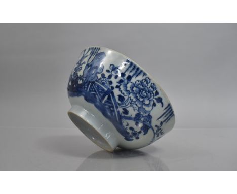 An 18th/19th Century Chinese Blue and White Porcelain Bowl, Decorated with Fenced Garden Scene and Blossoming Flowers, 18cms 