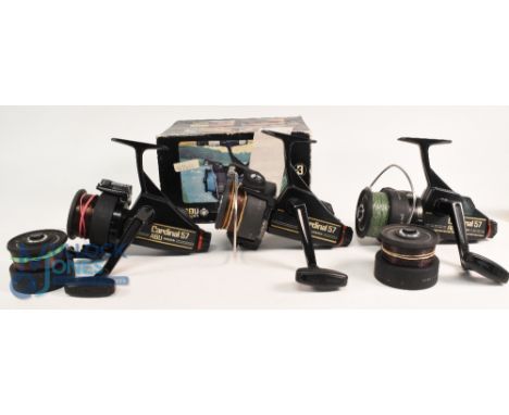 Three vintage Abu Cardinal 57 spinning reels, all retaining good original finish, including one with 2 spare spools and maker