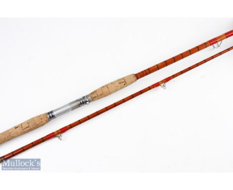Unnamed split cane boat rod, 7' 3" approx., 20" handle with alloy down locking reel seat, oversized stripping ring, good cond