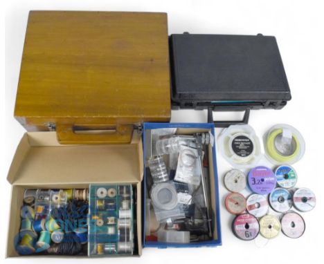 Large quantity of fly tying materials, tools, feathers, hooks etc., in a wooden case 15"x13", assorted fly vices, spools and 