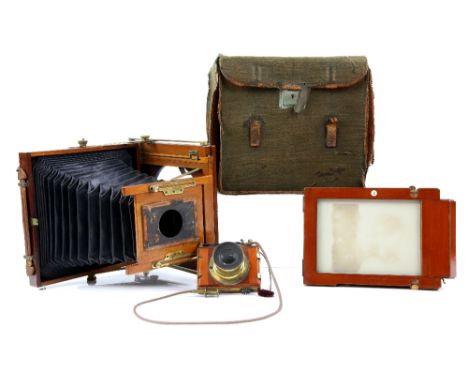 Early 20th century plate camera in case  and a surveyors level 
