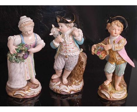 Three late 19th century small Meissen porcelain figures of children in the 18th century style, the first being a girl with a 